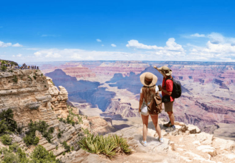 best national parks for a romantic getaway featured image couple at grand canyon